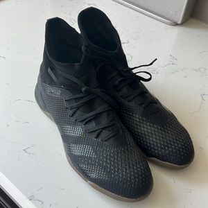 Men’s Adidas Predator indoor soccer shoes.